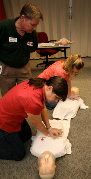 red cross teaching first aid cpr